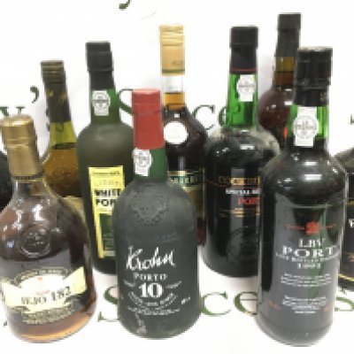 Ten bottles of port and brandy comprising examples by Taylor's, Cockburns, Three Barrels and others. Shipping category D.