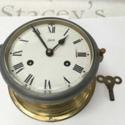 A brass Schatz royal mariner ships clock.