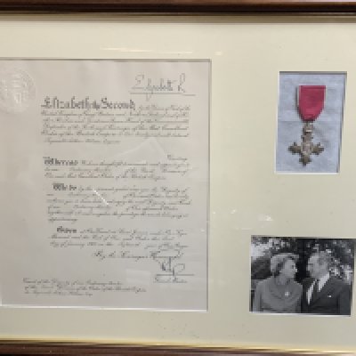 A Framed Civilian MBE awarded to Reginald Arthur Wilson for his works with TMT (The Migrane Trust) January 1967. (D)- NO RESERVE