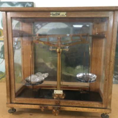 A vintage set of analytical balance scales.
