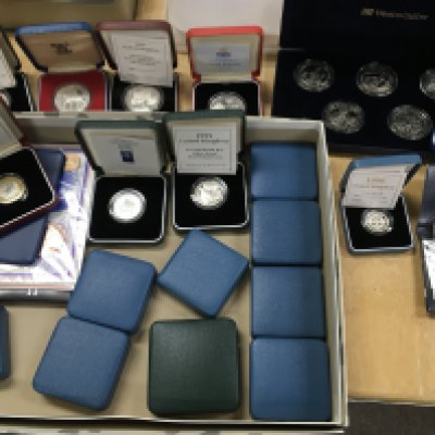 A collection of assorted coinage including some silver examples. Postage B