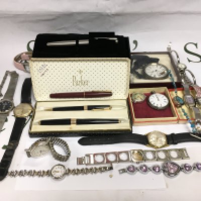 A collection of watches and pens. Shipping category B.