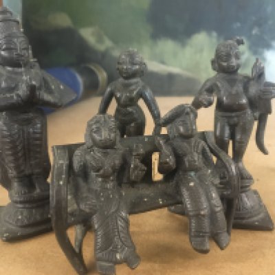 four small bronzed Indian figures. 10 cm