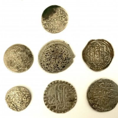 A small collection of early Rupees. (A)