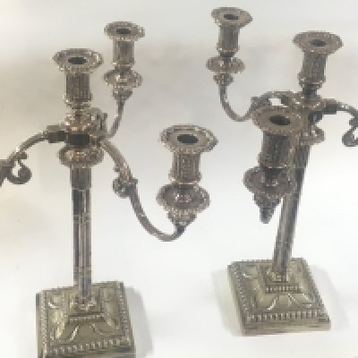 A pair of late 19th century silver plated candelabras , 47cm tall 36cm wide