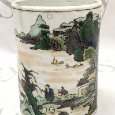 A Chinese famille verte brush pot , one side featuring a river temple scene and the other with Chinese characters. Dimensions 13.5cm tall 10.5cm wide . This lot cannot be posted