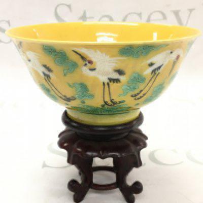 A Chinese yellow glaze dish with crane design, six character to base. 15cm wide ,7cm tall. This lot cannot be posted