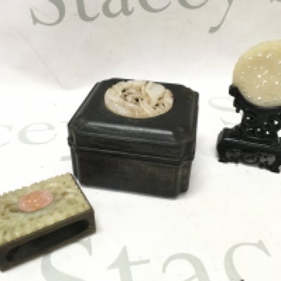 Chinese Jade items including a matchbox holder, trinket box and an ornament on a wooden stand. Postage category B