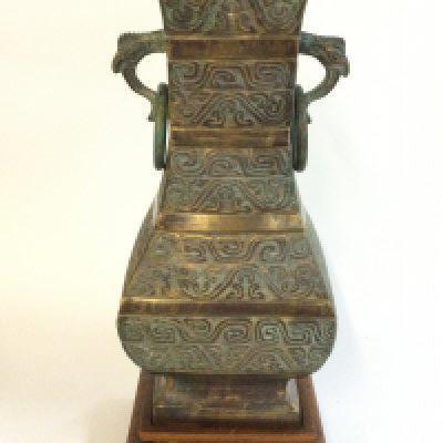 A large Chinese bronze Archaic form vase with stand , 34cm tall. Postage category C