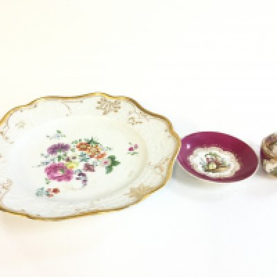 Meissen style plate (27cm wide) and a cup (7cm tall) and saucer (11cm wide) .