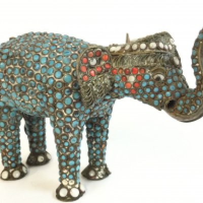 A Chinese coral and turquoise filigree elephant .no reserve . Postage category B