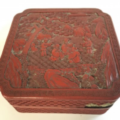 A large Chinese red cinnabar box 7.5cm tall , 19cm wide. Postage category B