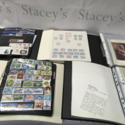 A collection of world stamps and prints.