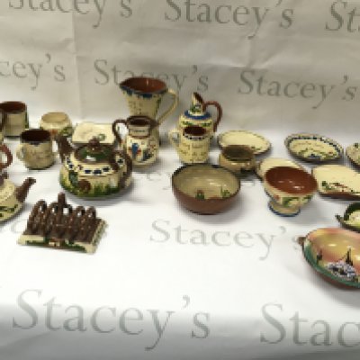 A collection of various Torquay mottoware.