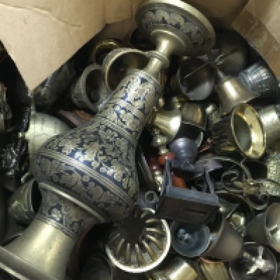 A large Collection of brass bells with various designs