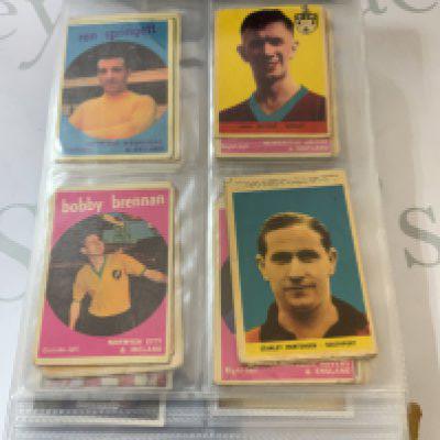 A&BC a large amount of football cards from each premier league team including descriptions on the back of each card, and cards from multiple different nations. Large book.