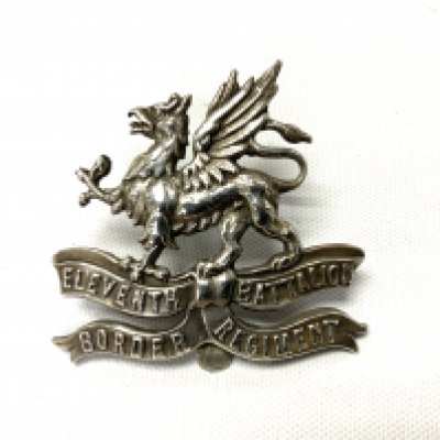 First World War Silver Cap Badge for the Eleventh Battalion Border Regiment, hallmarks for London 1914, maker's mark SG