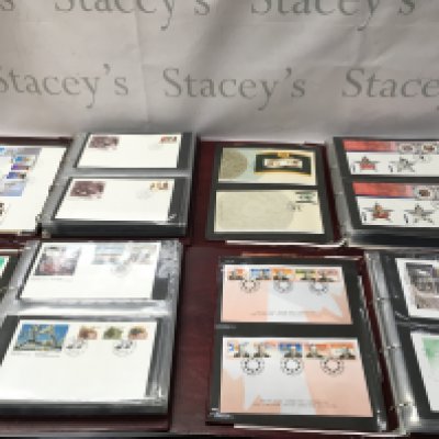 Four albums of first day covers. No reserve