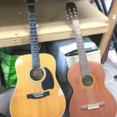 A Tanglewood TW 400n acoustic guitar and a Kimbara classical guitar with a soft carry case (2).