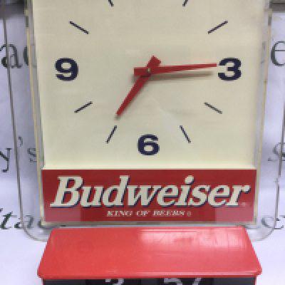 Two retro clocks and drinks trays etc.