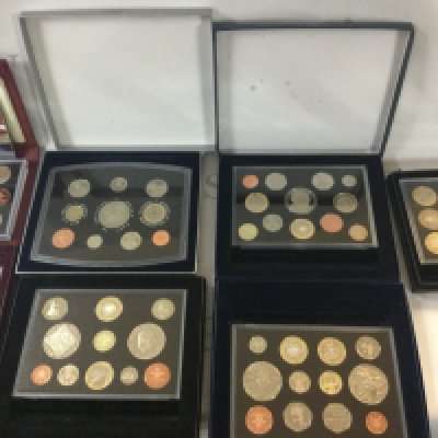 A large collection of coins with dates ranging from 2000 to 2011.