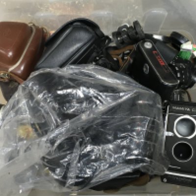 A Collection of vintage cameras including an Olympus M10, Mamiya C330, Chinon CE-4, Zenit-B, Agfa optima I. Also including lenses and accessories