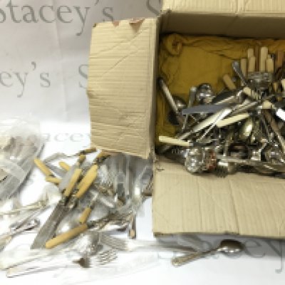 A collection of assorted cutlery including silver plate etc.