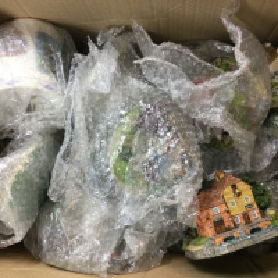 A large collection of resin houses and other buildings, some from the Scenic Shores collection and The Farmers Journey collection, and more collections. Also there is a vintage mug.