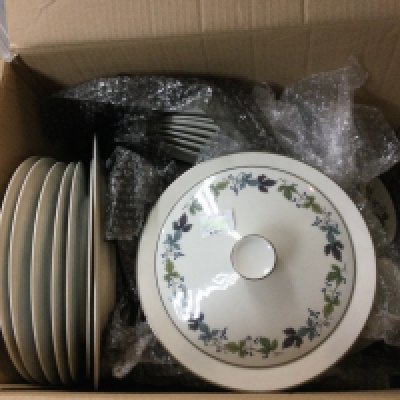 A large collection of antique dishes like plates and more.