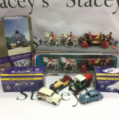 A collection of die cast vehicles comprising two boxed Corgi 1902 State Landaus, a limited edition Golden Jubilee bus set etc.