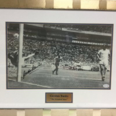 A framed and glazed signed print of Gordon Banks with COA, approx 60cm x 47cm. Shipping category D. NO RESERVE