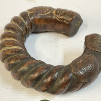 An African Manilla bronze slave currency bracelet, 8cm wide. Postage category A. NO RESERVE