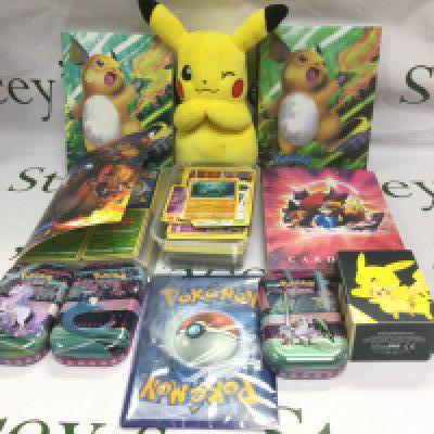 A collection of Pokemon cards and accessories.