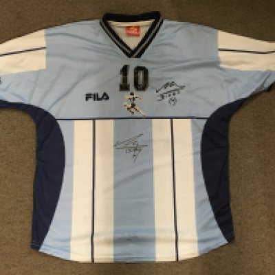 A signed Diego Maradona shirt, with a certificate of authenticity.
