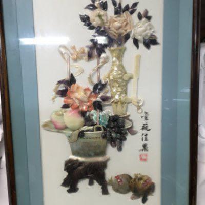A late Republic Chinese three dimensional picture with raised mother of pearl and polished stones. 45x85 cm approximately.