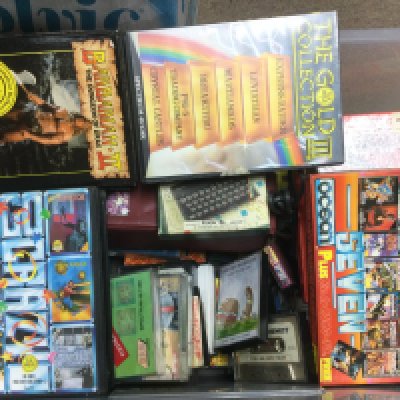 A box of vintage computer games comprising many Sinclair Spectrum games.