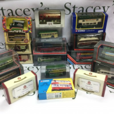 A box of die cast vehicles comprising mainly boxed buses.