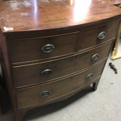 A late George III mahogany bow fronted chest of drawers fitted with two short and two long drawers on swept bracket feet nice original condition. Length 90cm. NO RESERVE