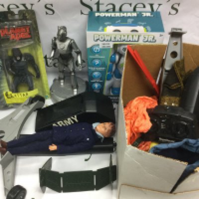 A box of toys and models comprising Action Man outfits, a remote control Helicopter and other items.
