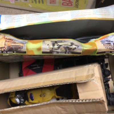 A collection of toys including a boxed Italeri Battle of the Bulge model set, ATV and a model bike