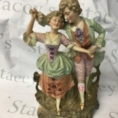 A pair of porcelain figurines.