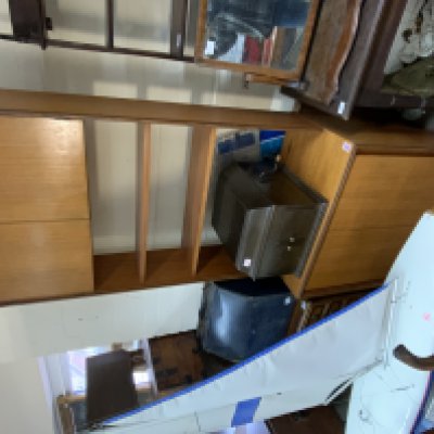 a modern G-PLan style open bookshelf with upper and lower cupboard sections. (D)