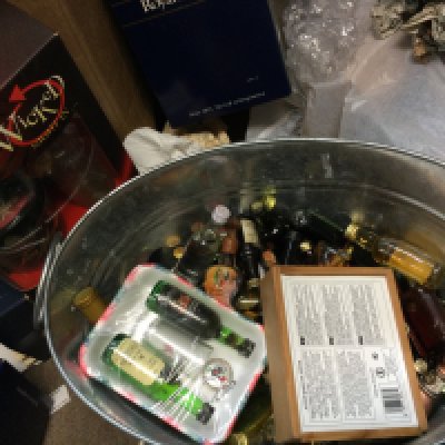 A collection of Miniature spirits and a bottle of Tia Maria