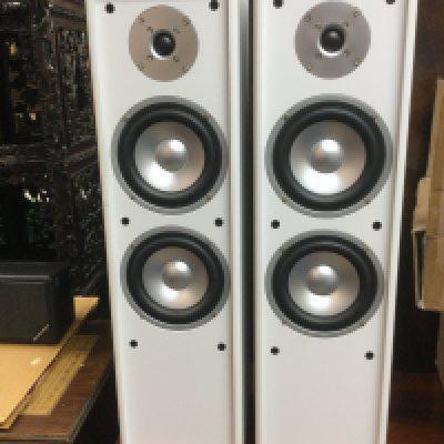 A collection of audio visual equipment comprising a pair of floorstanding speakers, subwoofer, a vintage portable TV and one other speaker (5).