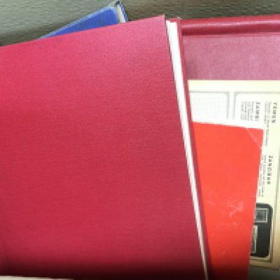 A Collection of world stamp albums containing used and unused stamps from China, Brazil etc