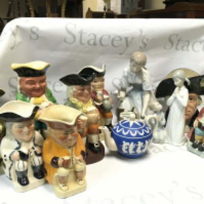 A Collection of ceramics including Toby jugs, Lladro figures, Wedgwood small tea jug, Doulton George Washington character jug