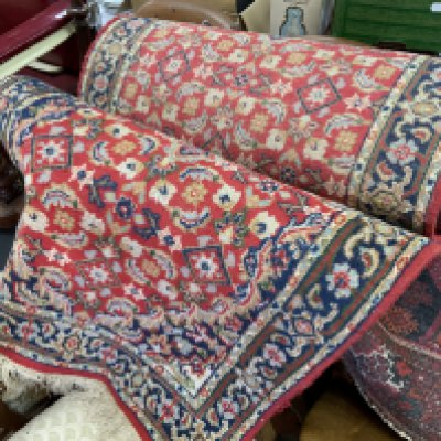 2 Persian style rugs. (D)