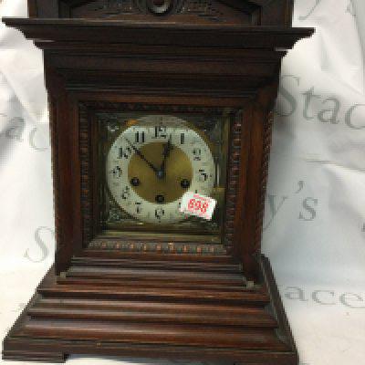 A Walnut cased early 20th century mantel clock. Height 46cm