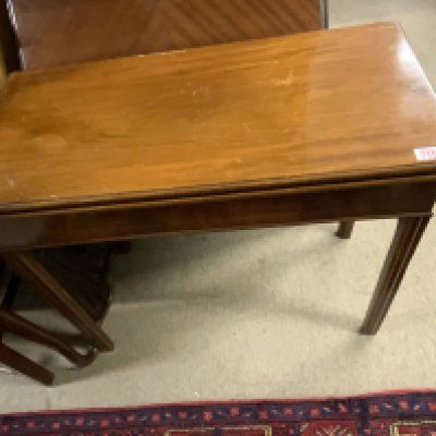 A George III mahogany folding top breakfast/card table table. 88cm x 42cm x 74cm