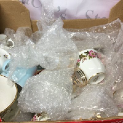 A collection of plates, glasses, bowels, mugs and more mostly from Bone China.